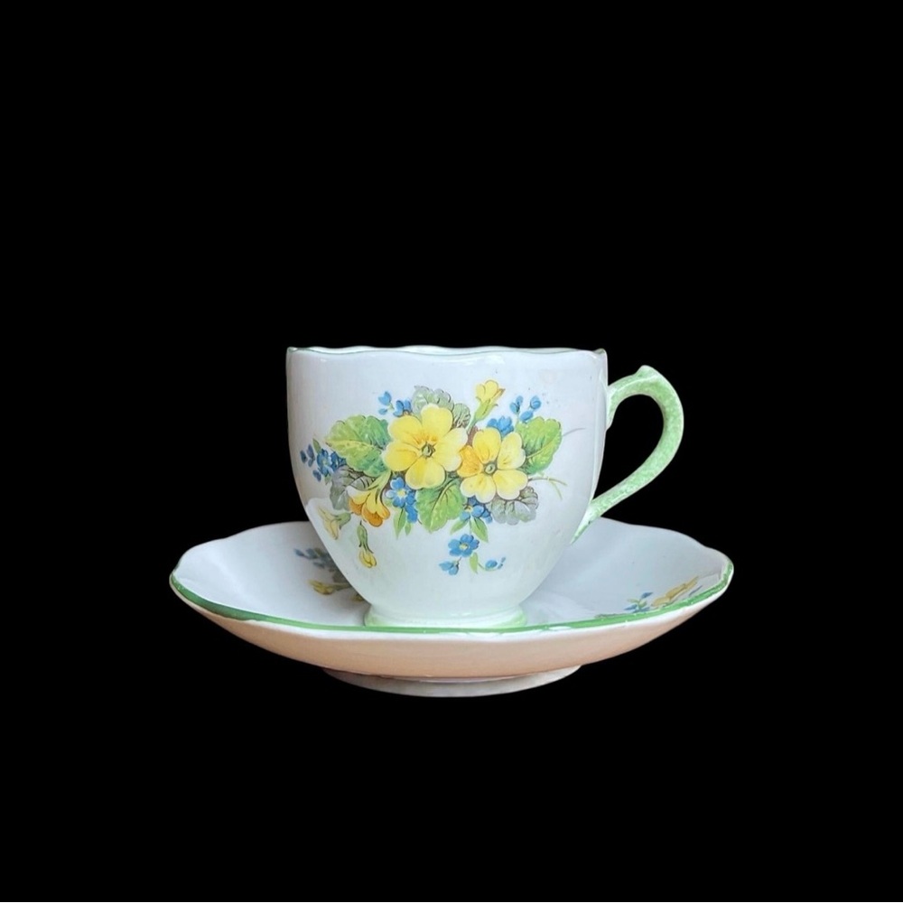Roslyn China Primrose Yellow Teacup & Saucer Set with Green Trim
